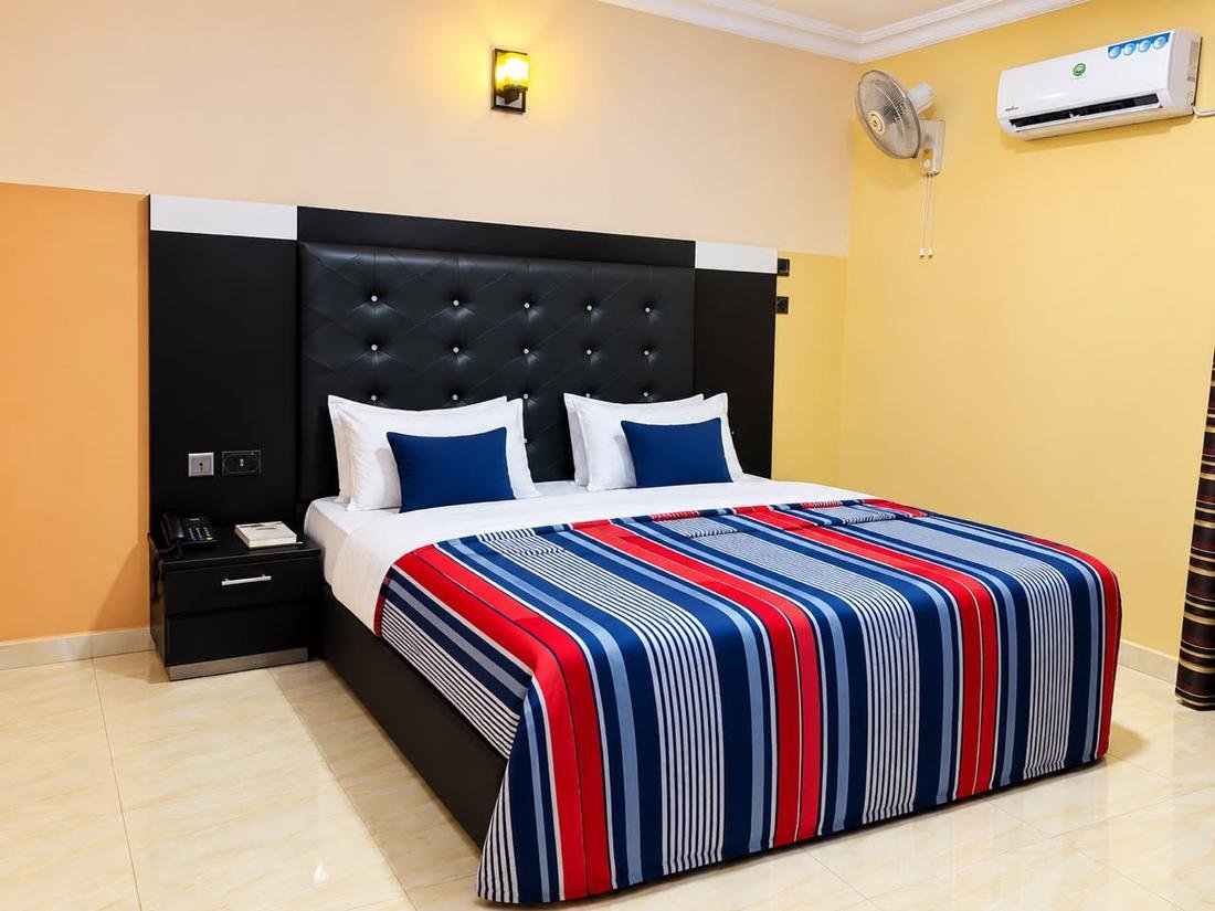 Royal Room bed with striped bedding